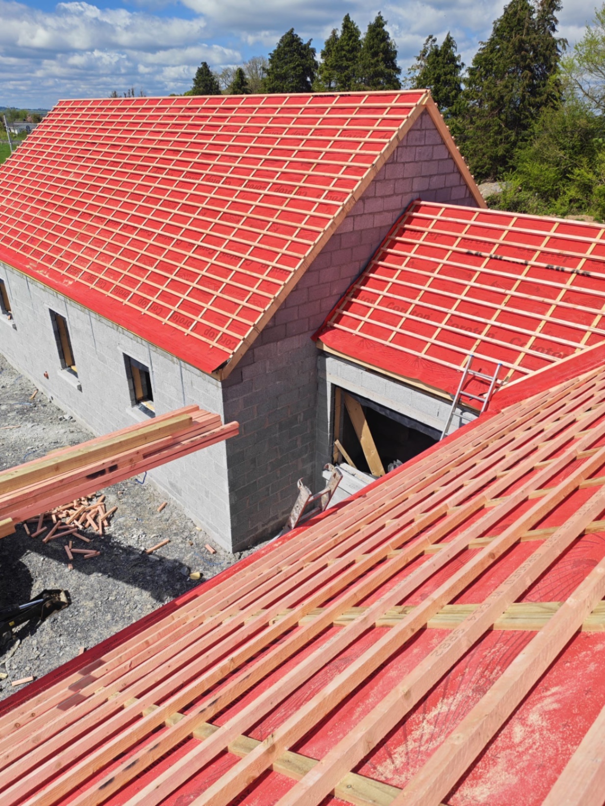 Roof repair in progress with new breathable felt and timbers